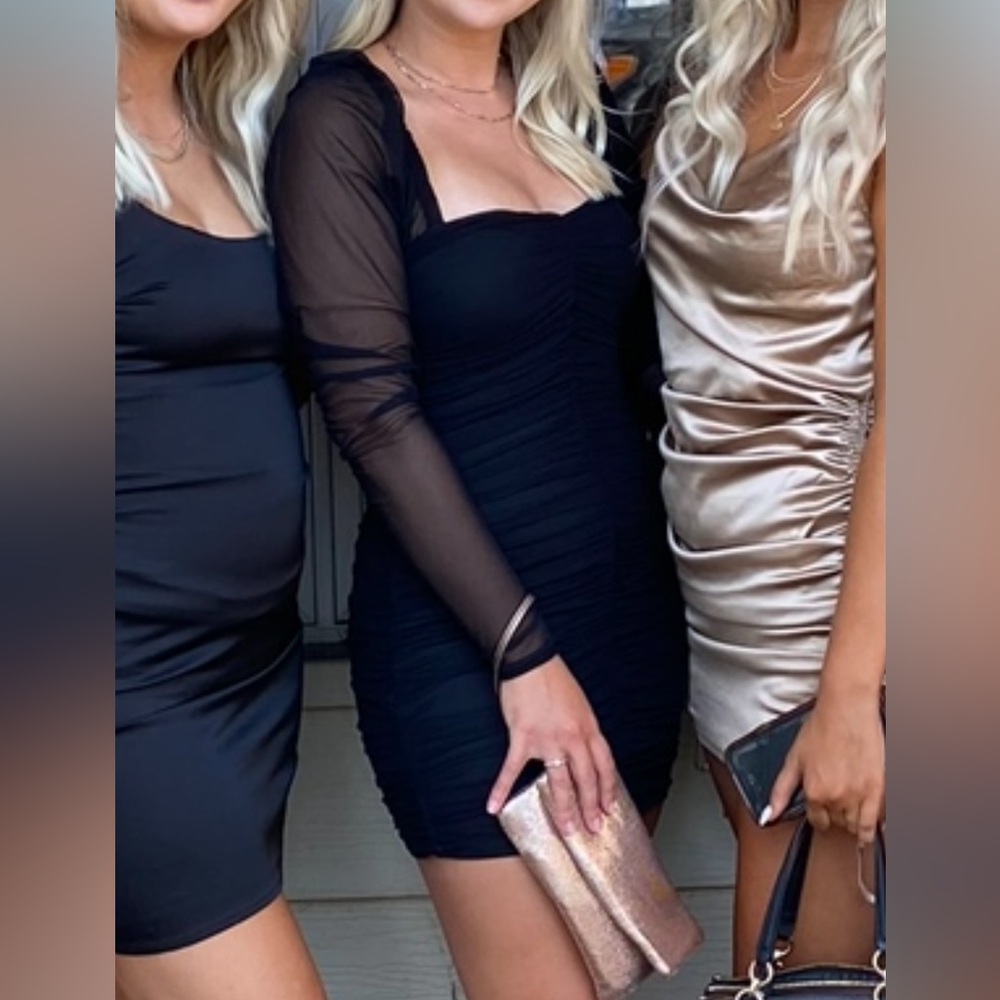 Black mini dress with mesh sleeves